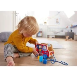 HABA 304317 - Ziehfigur - Feuerwehrauto -Spielzeug Welten Winkel 4010168240121 2 600x600