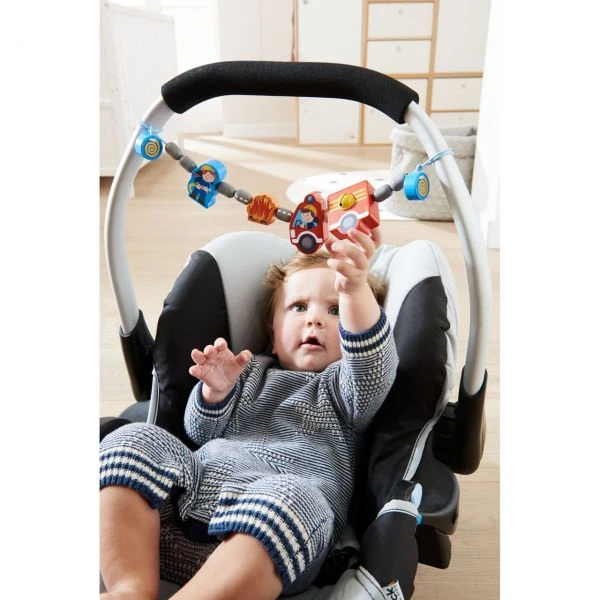 HABA 304633 - Kinderwagenkette - Feuerwehrauto HABA 304633 - Kinderwagenkette - Feuerwehrauto -Spielzeug Welten Winkel